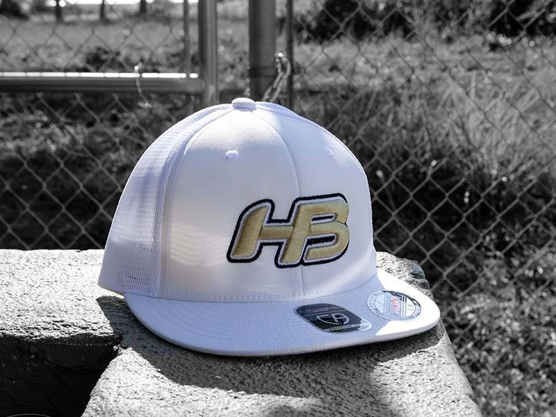 Headbanger Sports I8501 Cap America Flexfit Performance Trucker Mesh Back Hat: White & Gold 1 Headbanger Sports I8501 Cap America Flexfit Performance Trucker Mesh Back Hat: White & Gold